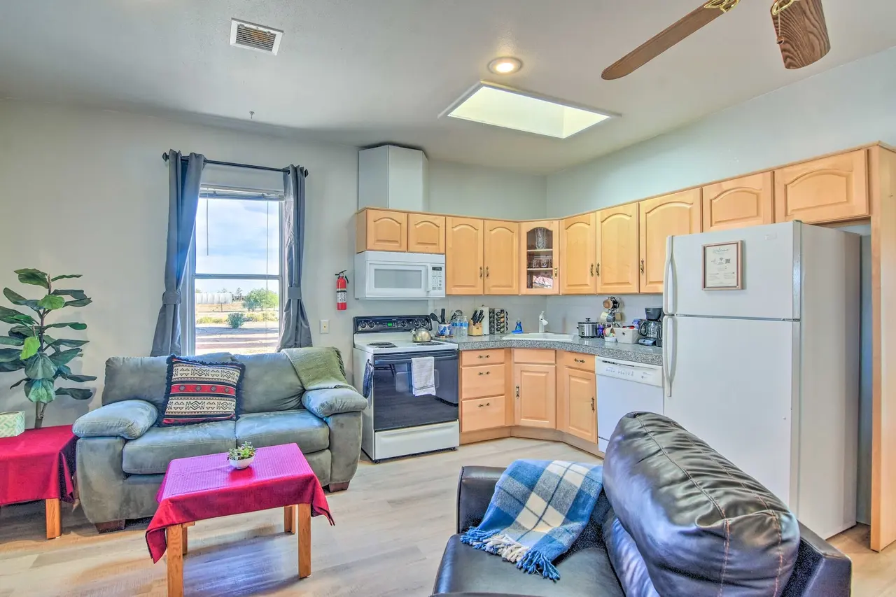 Casa 12 living room and kitchen with skylight and ceiling fan