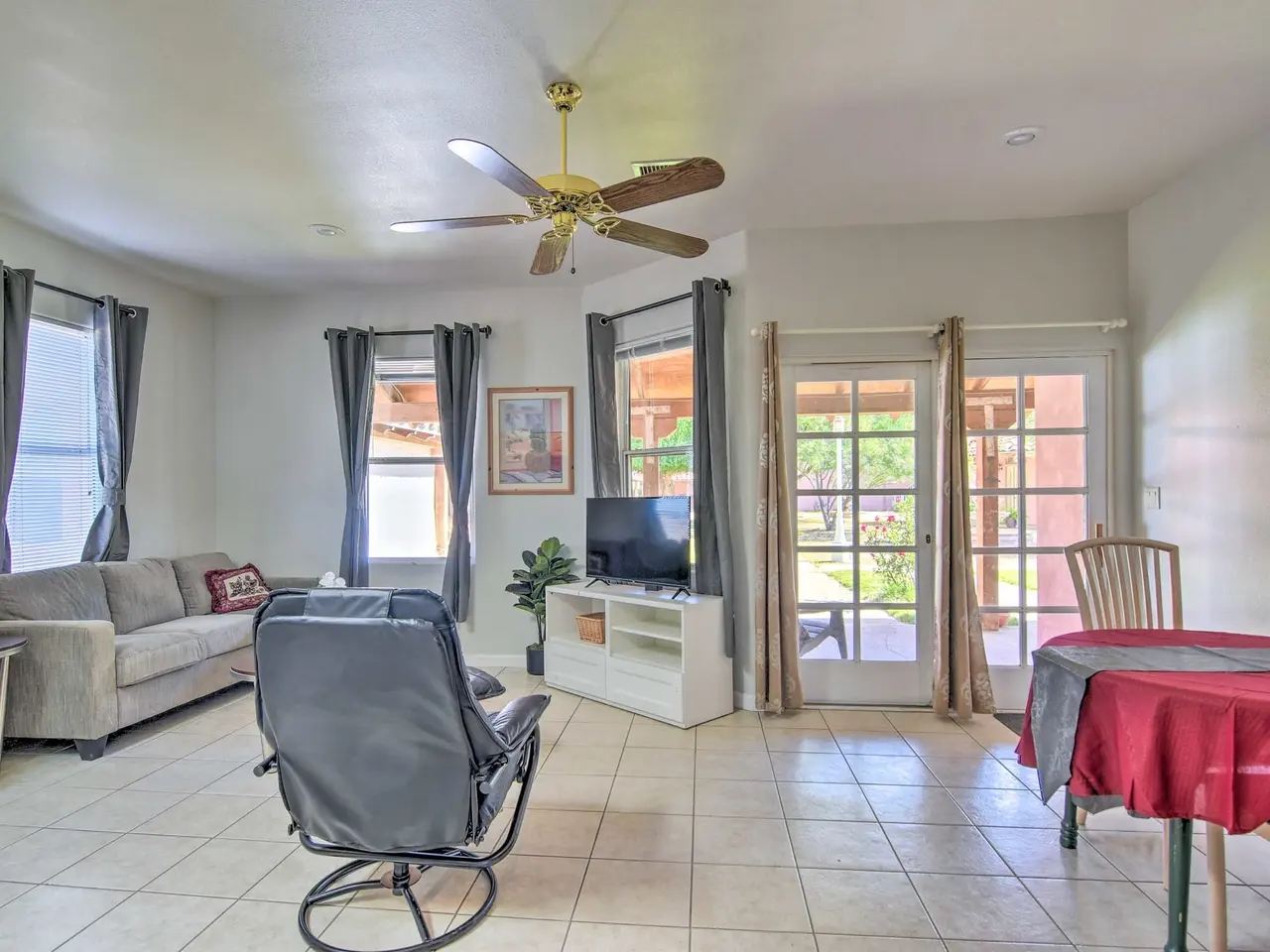 Casa 4 living room with recliner, sofa and French doors