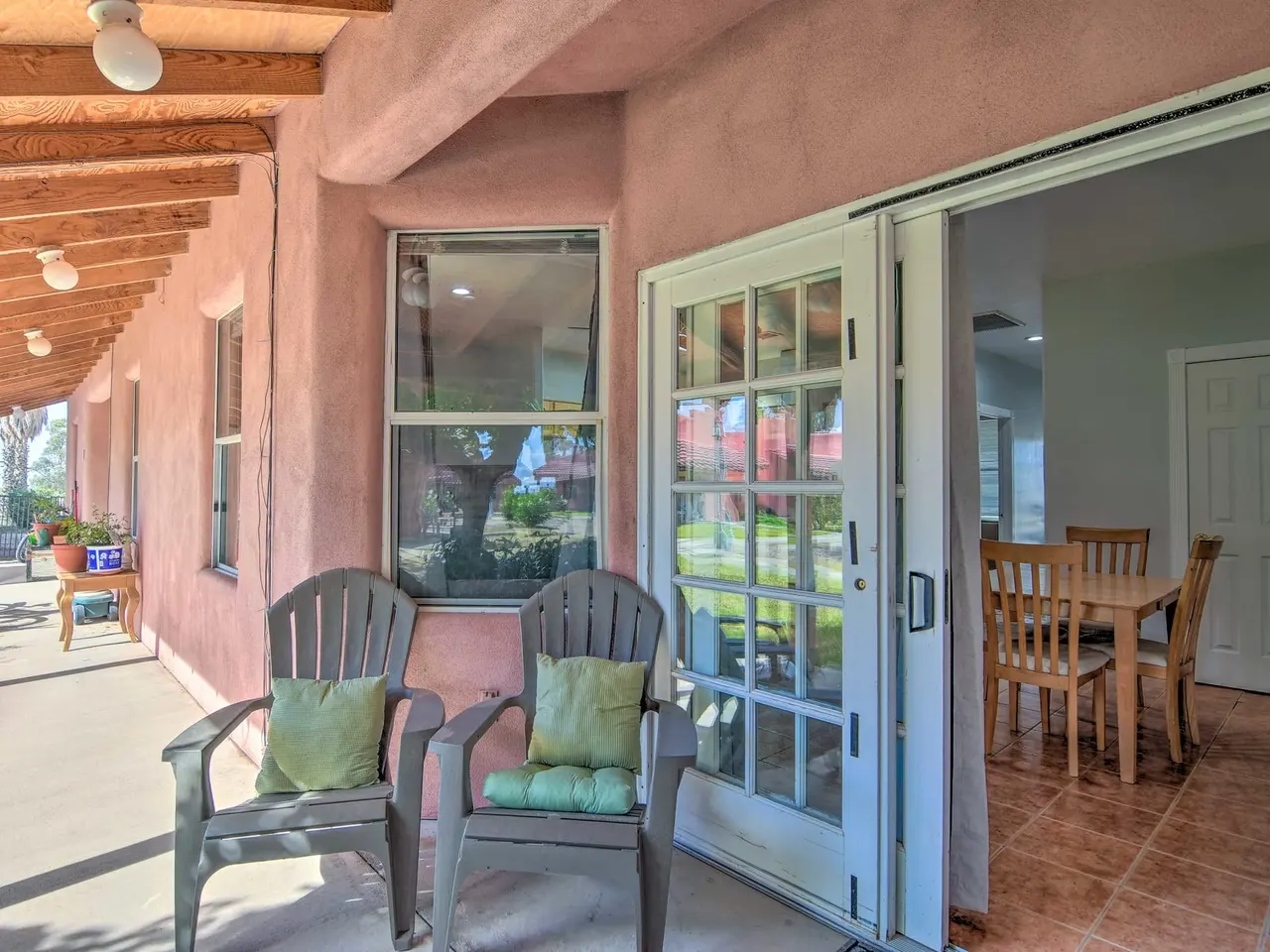 Casa 6 patio seating outside sliding glass doors