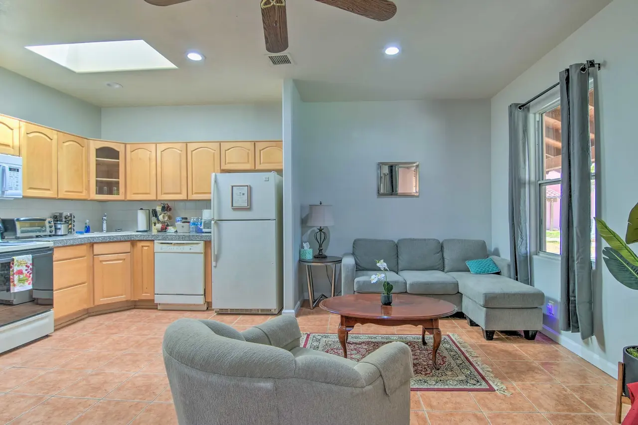 Casa 7 open living room and kitchen under a skylight