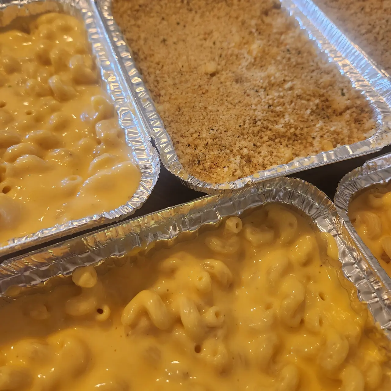 Trays of baked macaroni and cheese fresh from Chef Stephan’s kitchen