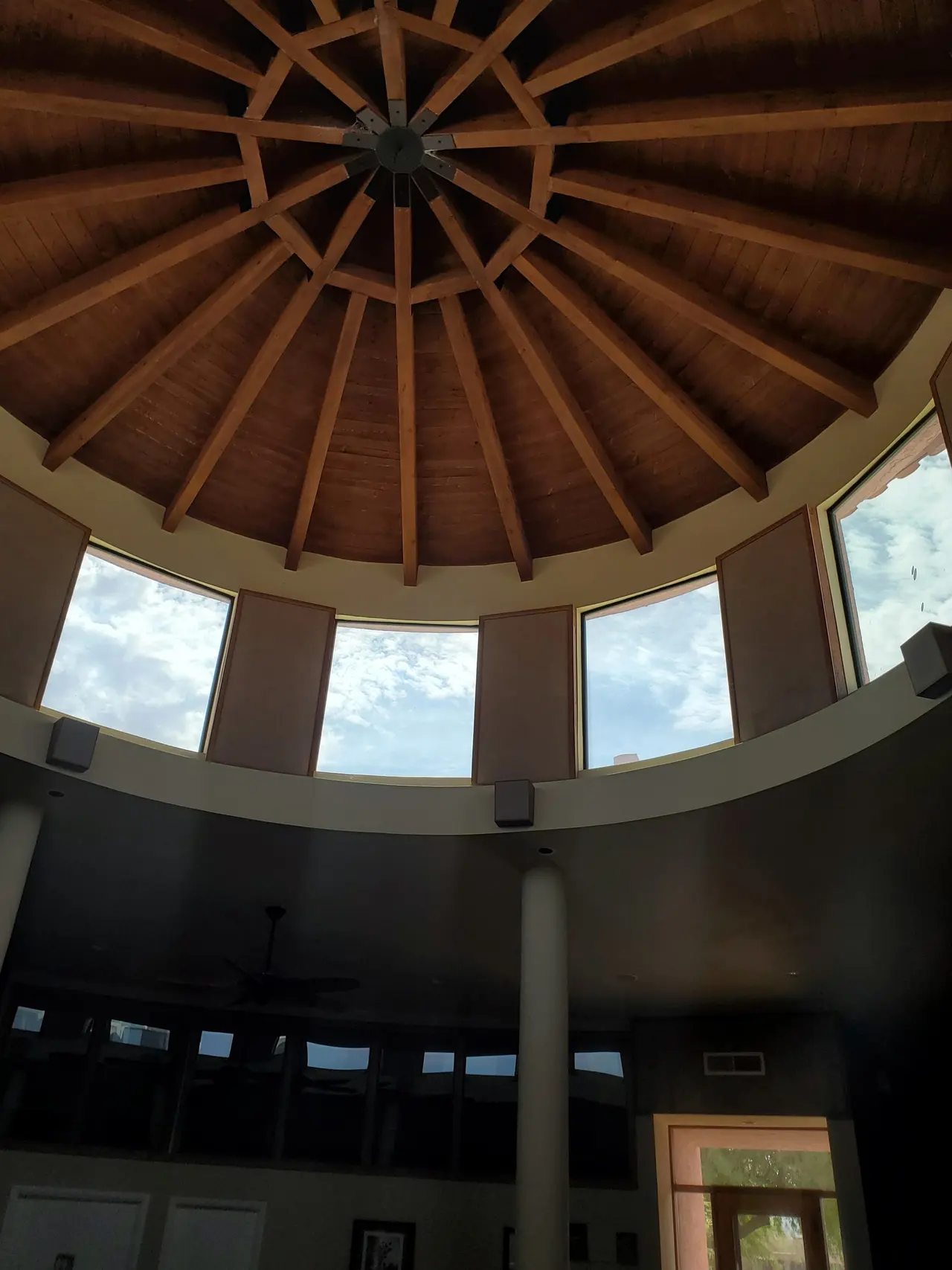 Looking up into the Round House's timber-ribbed dome
